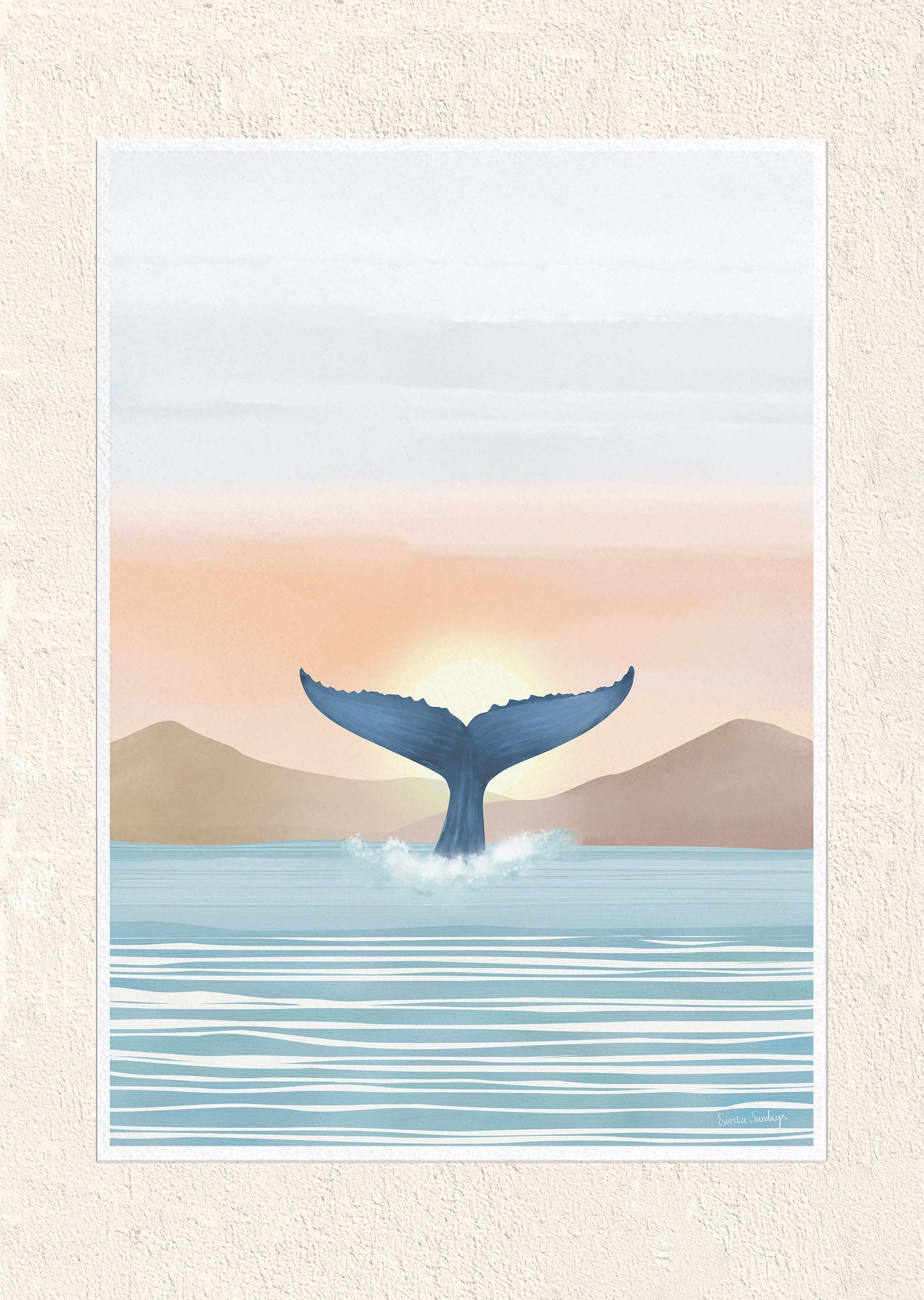 Whale tail emerging from water with a sunset in the background