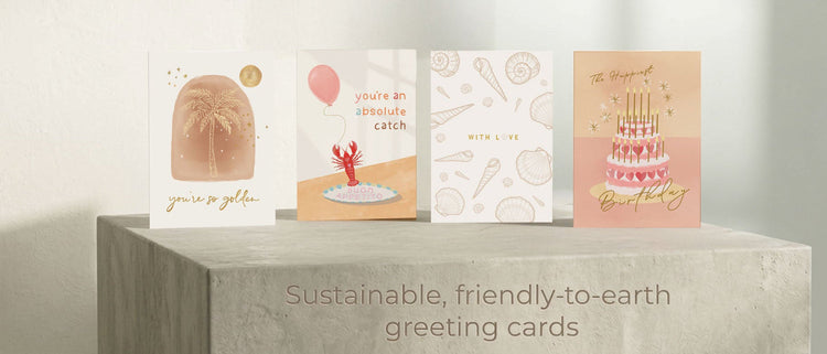 Greeting cards standing on a concrete surface