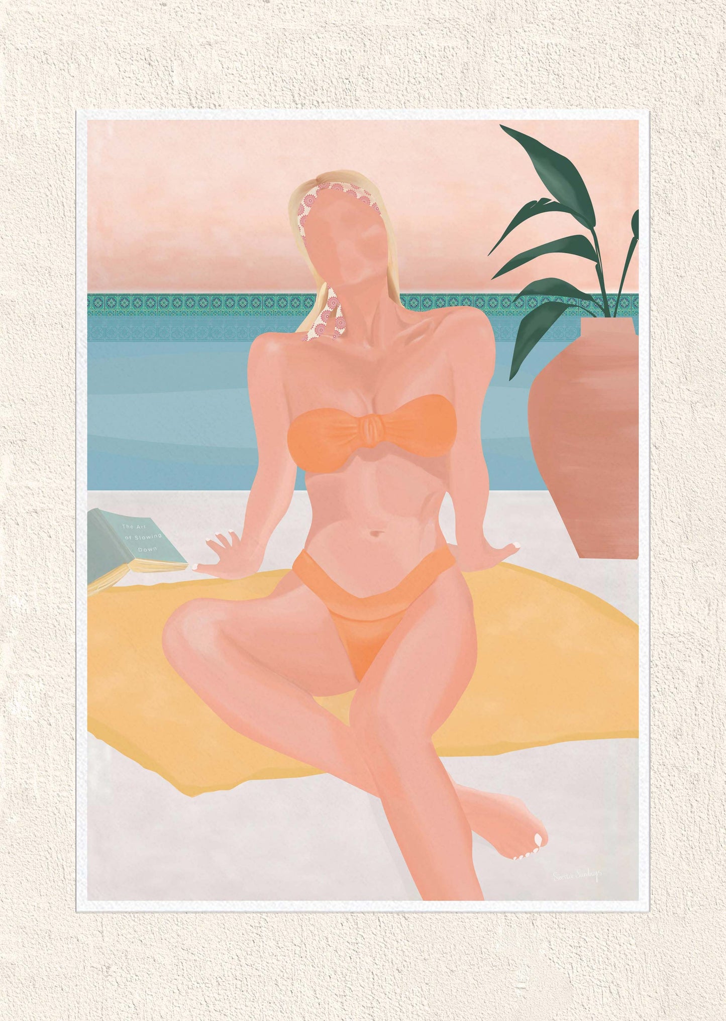 Woman in an orange bikini sitting on a towel with a plant in the background
