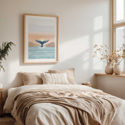 Nautical-themed wall art above a bed in a bright bedroom with natural light.