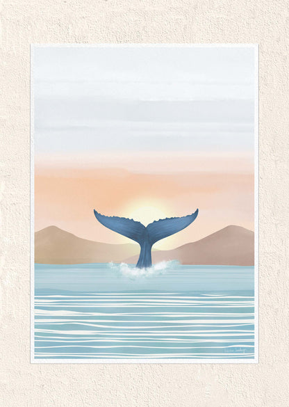 Whale tail emerging from water with a sunset in the background